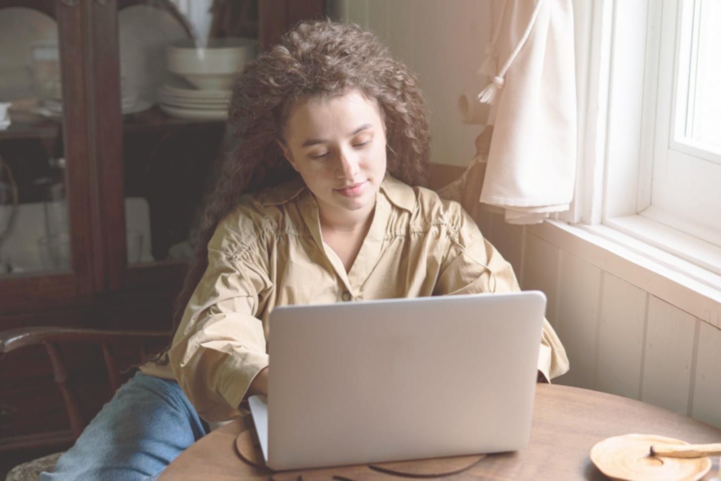 Professional working with financial documents and analysis tools